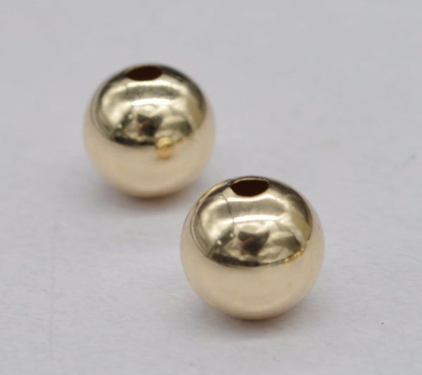 14k Yellow Solid Gold 8mm Bright Seamless Round Beads 1 Pc.