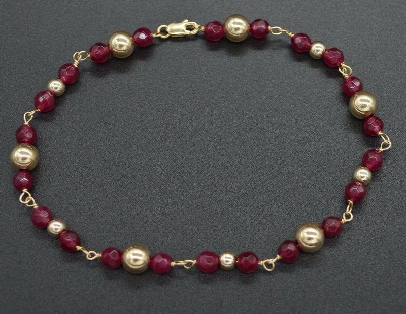 NEW 14K Solid Yellow Gold and Natural Ruby Round Bead Bracelet 8".jpg