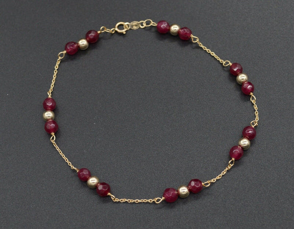 NEW 14K Solid Yellow Gold Natural Ruby Round Bead Bracelet.jpg