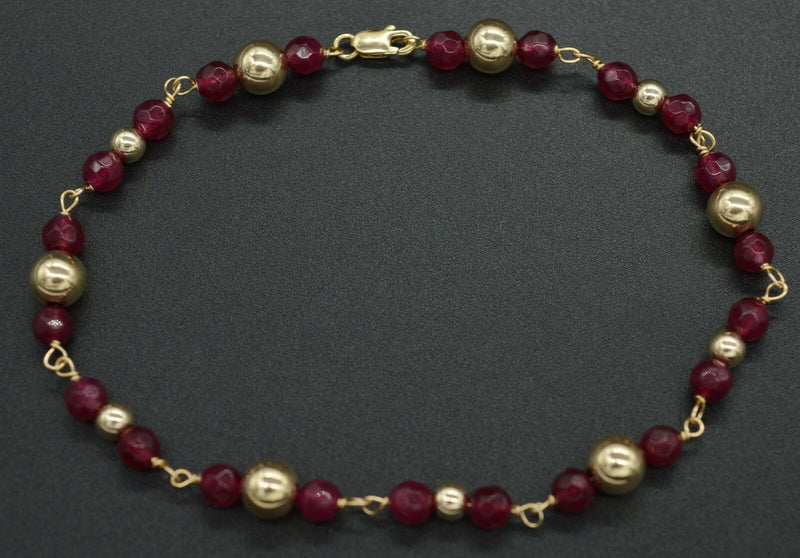 NEW 14K Solid Yellow Gold and Natural Ruby Round Bead Bracelet 8".jpg