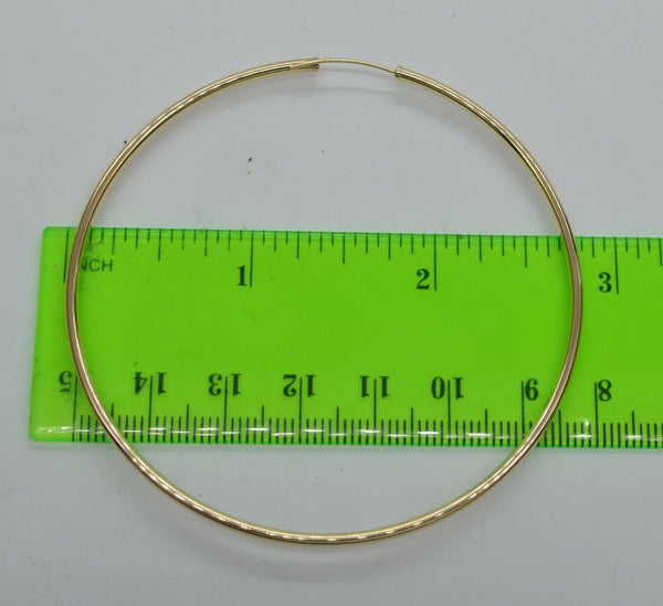 14k Solid Yellow Gold big Large Endless hoop Earrings. 70mm x 2 MM 3.2gr