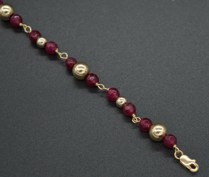 NEW 14K Solid Yellow Gold and Natural Ruby Round Bead Bracelet 8".jpg